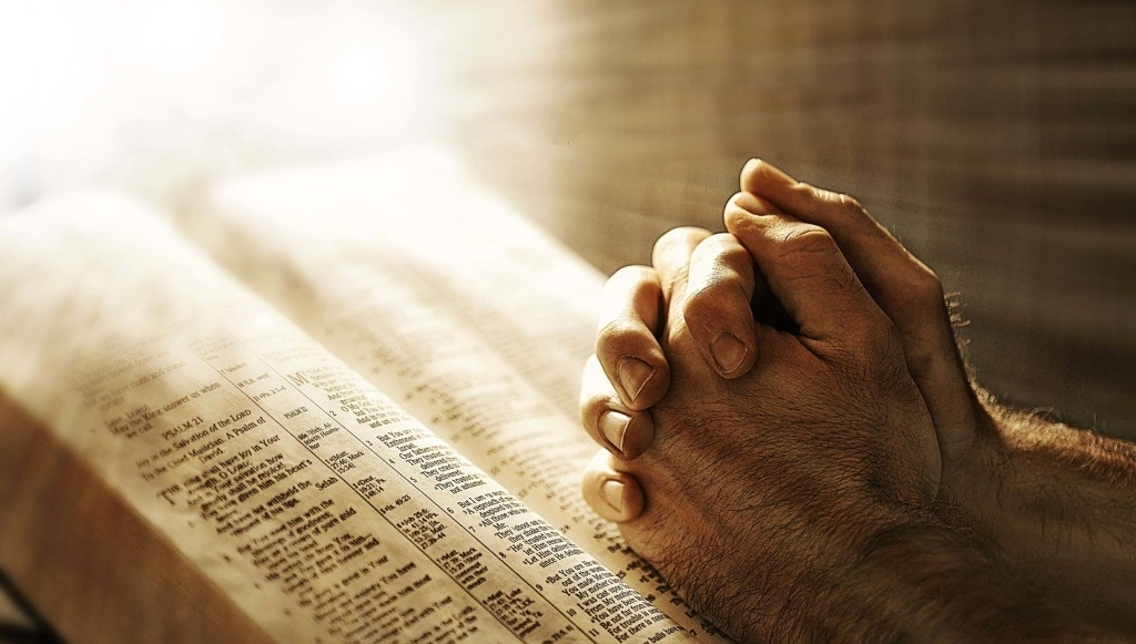 bible hands in prayer